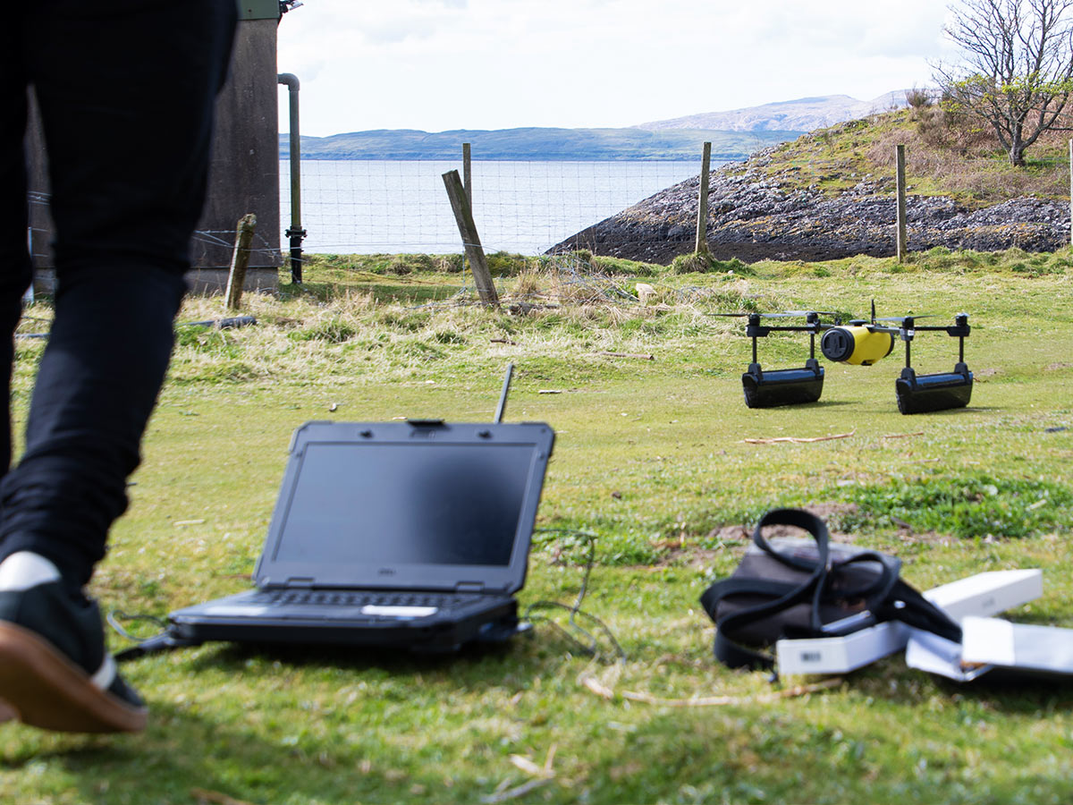 A scientific drone on the ground waiting to be piloted